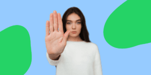 Girl with her hand up for a sign to stop