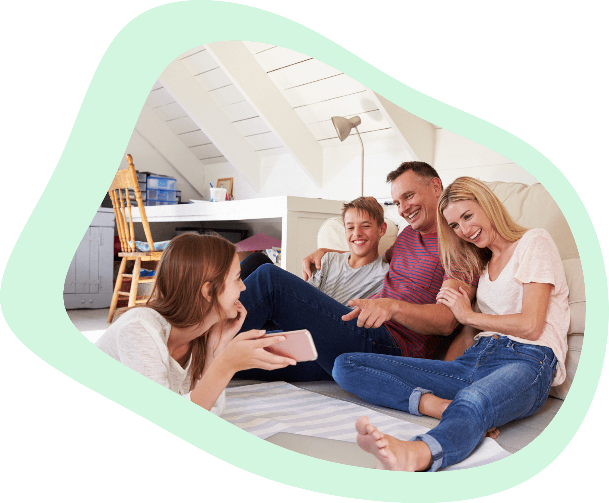 Teenage daughter showing her phone to mom, dad and brother