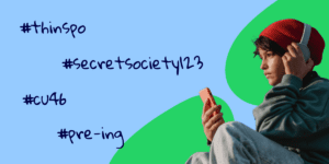 Teenage boy looking at mobile showing unsafe hashtags