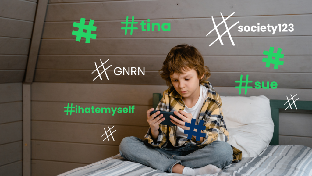 Boy on phone looking at hashtags every parent needs to know